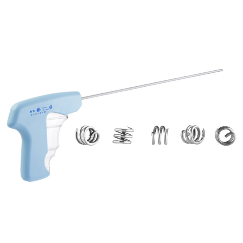 Hernia mesh fixation device with titanium tacker